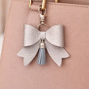 Silver Pebble Faux Leather Bow Bag Charm Key Chain